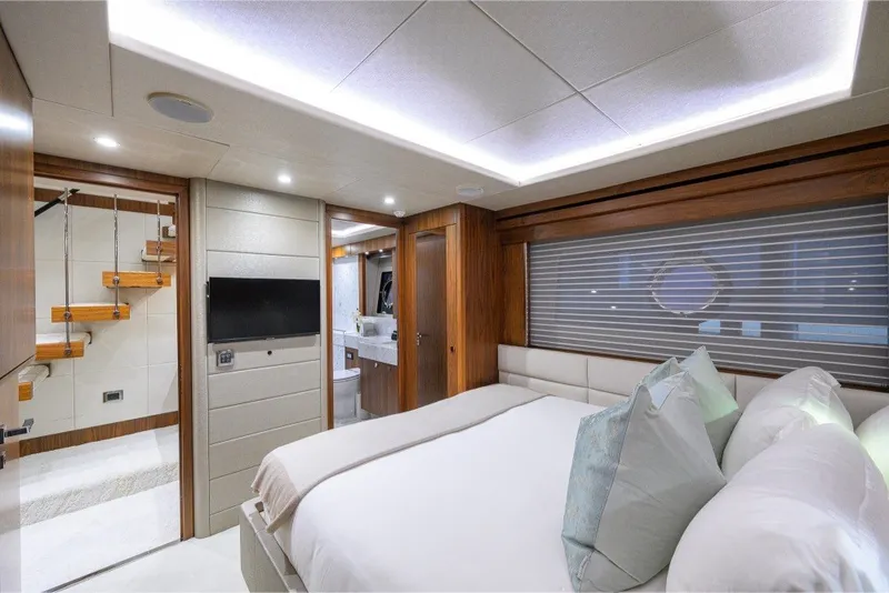 Slide: The Image of Luxurious bedroom interior of 2018 Sunseeker 86 Yacht with modern design and elegant furnishings. - 49