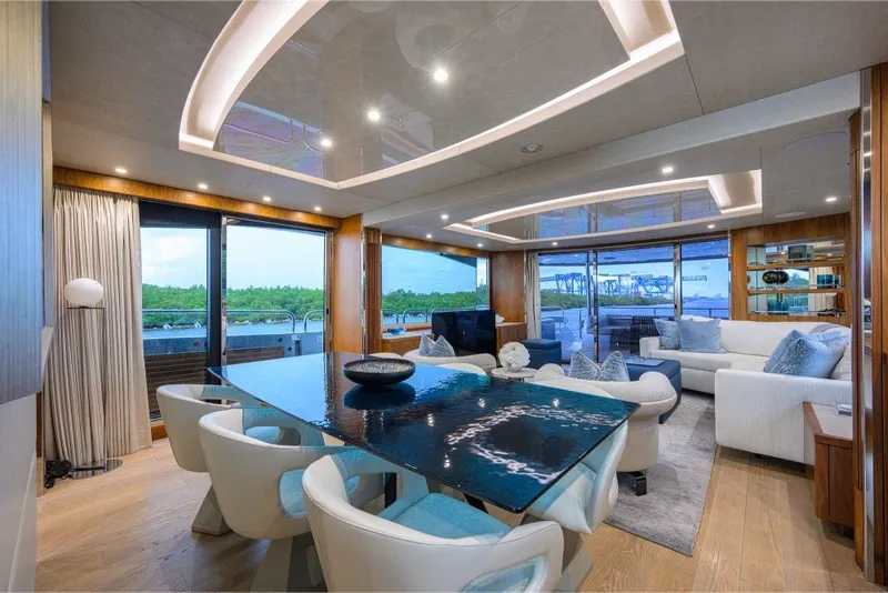 Slide: The Image of Luxurious interior of 2018 Sunseeker 86 Yacht with elegant dining and seating area. - 21