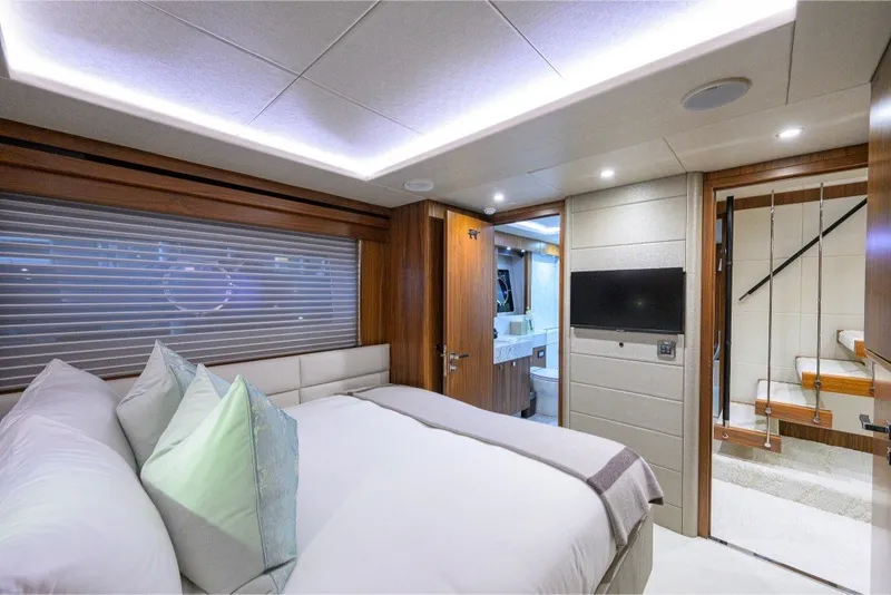 Slide: The Image of Luxurious bedroom interior of 2018 Sunseeker 86 Yacht with modern amenities and elegant design. - 46