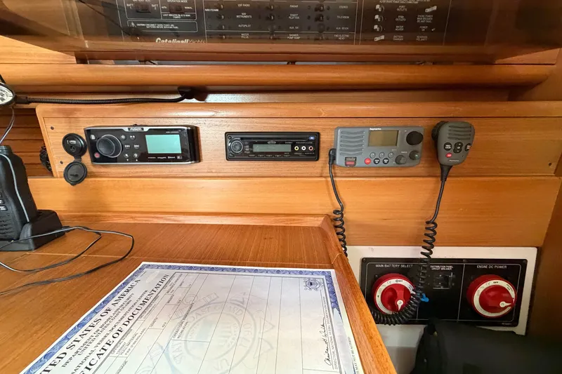 Slide: The Image of Control panel of a 2014 Catalina 445 yacht with navigation and communication equipment. - 39