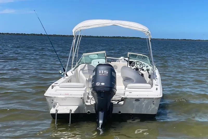 Slide: The Image of A 2011 Tidewater 196 DC Explorer with a 115 HP outboard motor, on calm water. - 4