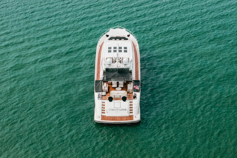 Slide: The Image of Aerial view of 2006 Arno Leopard 31 yacht on turquoise water. - 3