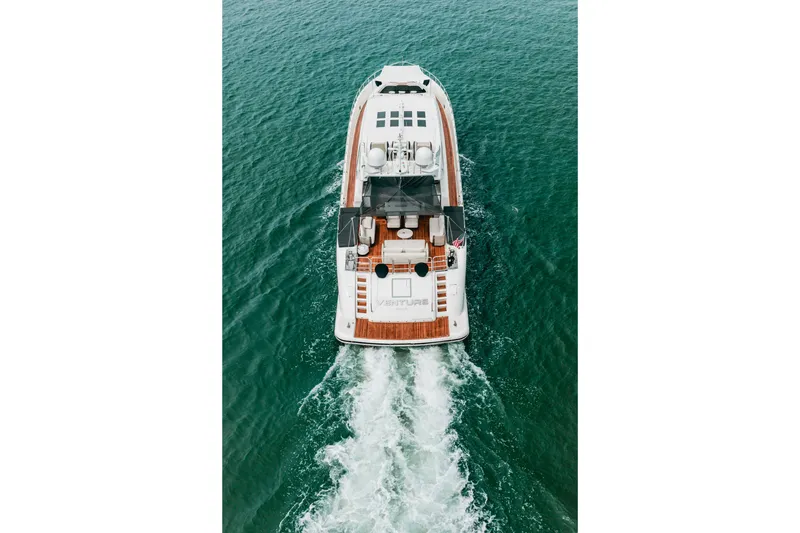 Slide: The Image of Aerial view of 2006 Arno Leopard 31 yacht cruising on open water. - 4