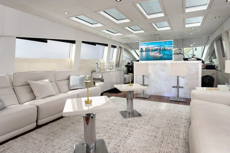 Slide: The Image of Luxurious interior of 2006 Arno Leopard 31 yacht with modern seating and entertainment area. - 10