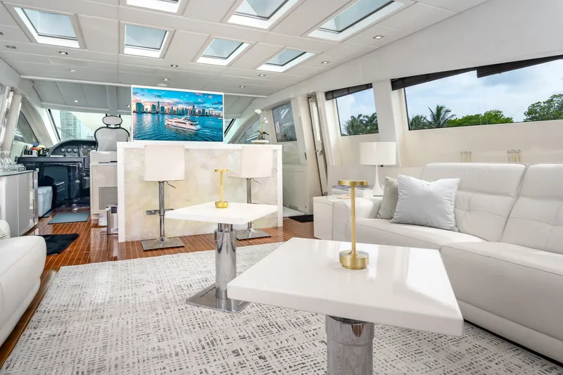 Slide: The Image of Luxurious interior of 2006 Arno Leopard 31 yacht with modern white furnishings. - 8