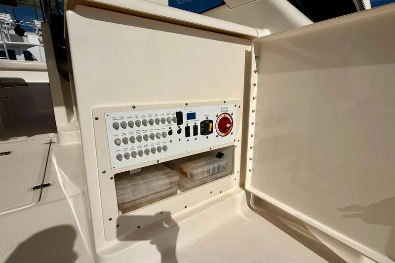 Slide: The Image of Control panel of a 2011 Pursuit DC 265 Dual Console boat. - 20