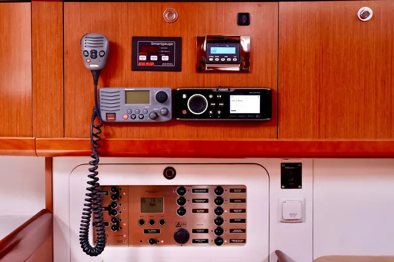 Slide: The Image of The interior view shows navigation and communication equipment aboard a 2011 Beneteau 40. - 11