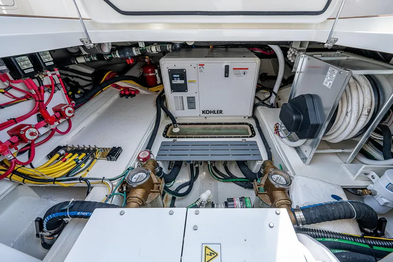 Slide: The Image of Der Motorraum eines Hinckley Sport Boat 40 X von 2023 mit einem Kohler-Generator. - 40