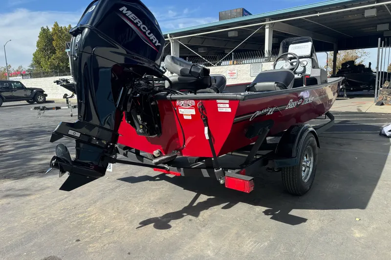 The Image of 2025 Tracker Bass Tracker Classic XL boat with Mercury engine, parked outdoors. - 0