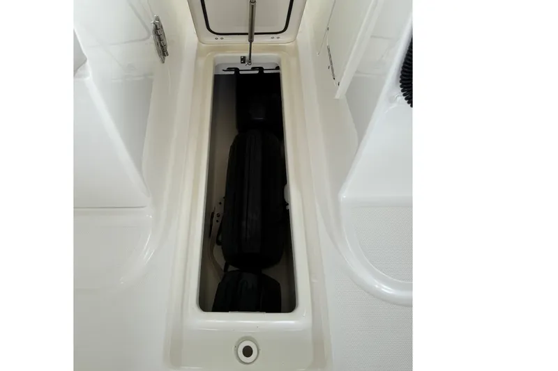 Slide: The Image of Storage compartment in 2019 Boston Whaler 270 Vantage boat, showcasing ample space. - 28
