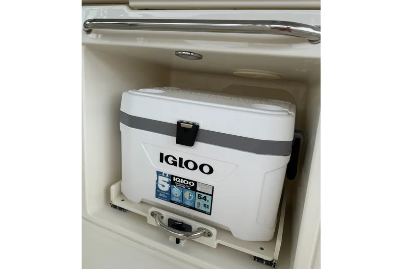 Slide: The Image of 2019 Boston Whaler 270 Vantage with Igloo cooler in storage compartment. - 24