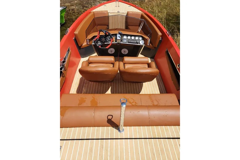 Slide: The Image of 2007 Frauscher 686 Lido boat interior with leather seats and modern dashboard. - 13