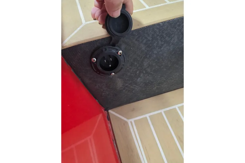 Slide: The Image of Boat deck detail of a 2007 Frauscher 686 Lido with an open socket cover. - 23