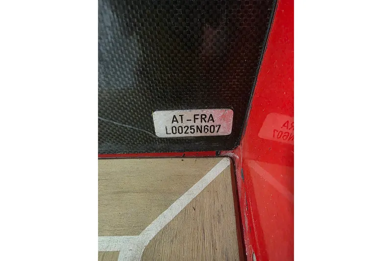 Slide: The Image of Serial number plate on 2007 Frauscher 686 Lido boat, featuring carbon fiber and wood details. - 20