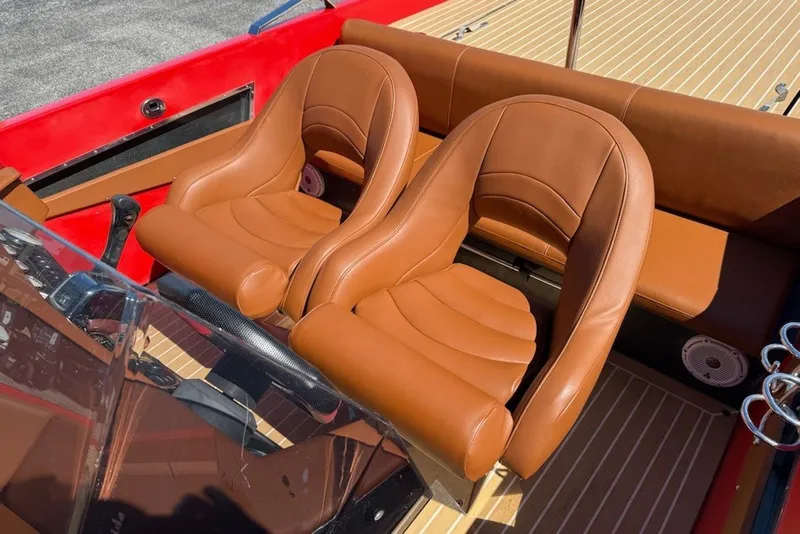 Slide: The Image of Luxurious brown leather seats on a 2007 Frauscher 686 Lido boat interior. - 9
