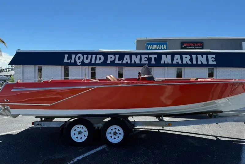 Slide: The Image of 2007 Frauscher 686 Lido boat in red, displayed at Liquid Planet Marine dealership. - 29
