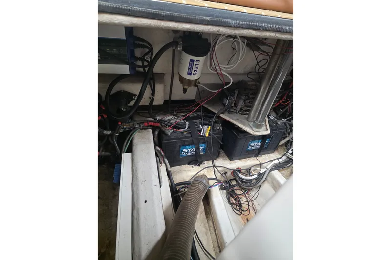 Slide: The Image of Electrical system of a 2007 Frauscher 686 Lido boat, featuring batteries and wiring. - 25