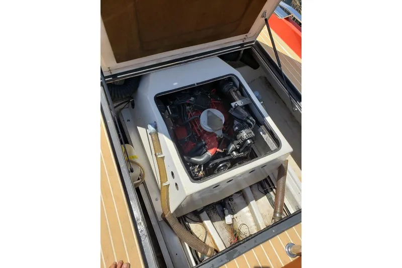 Slide: The Image of Engine compartment of a 2007 Frauscher 686 Lido boat, showcasing internal components. - 16