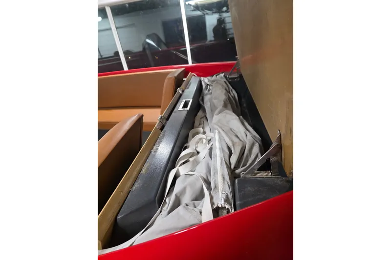 Slide: The Image of 2007 Frauscher 686 Lido boat interior with storage compartment and fabric cover. - 18