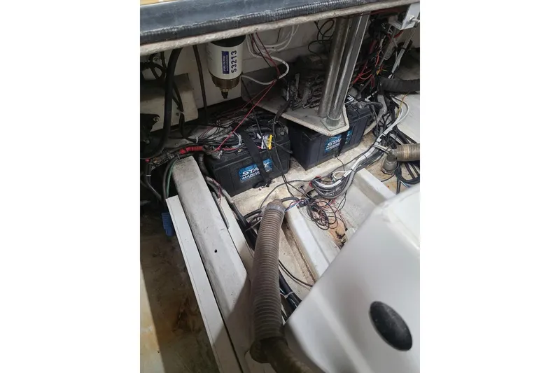 Slide: The Image of Engine compartment of a 2007 Frauscher 686 Lido boat, showing wiring and components. - 17