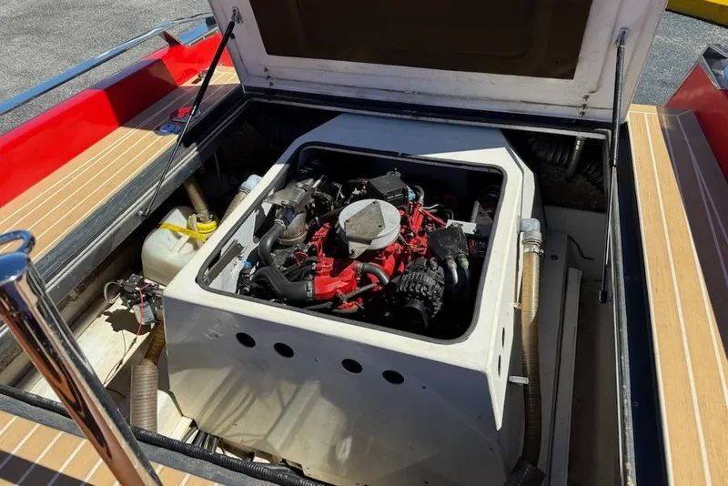 Slide: The Image of Engine compartment of a 2007 Frauscher 686 Lido boat, showcasing detailed mechanical components. - 15