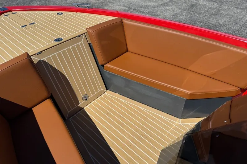 Slide: The Image of 2007 Frauscher 686 Lido boat interior with tan seating and red accents. - 6