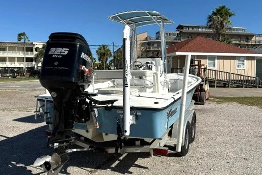 Slide: The Image of 2015 Mako 21 LTS boat with Mercury 225 Pro motor on trailer. - 4