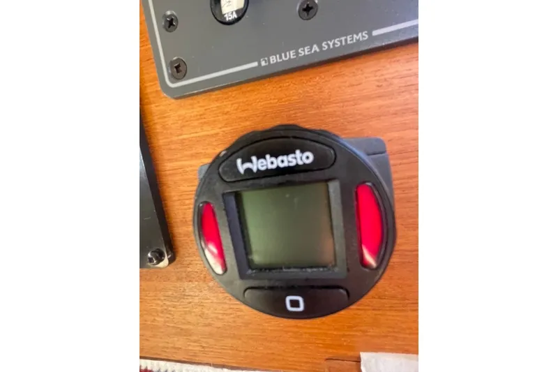 Slide: The Image of Webasto control panel on 2018 Ranger Tug R-27 boat dashboard. - 29