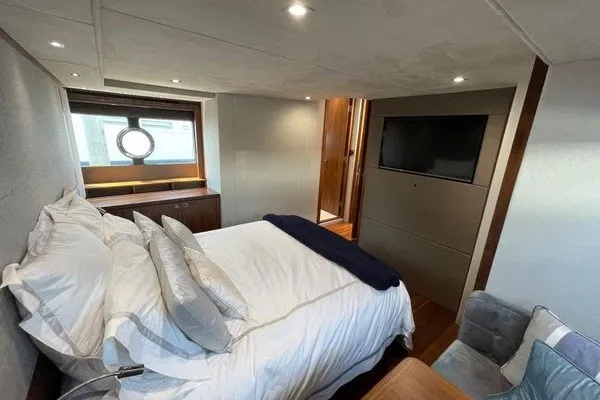 Slide: The Image of Luxurious cabin interior of 2016 Sunseeker Predator 57 yacht with bed and TV. - 55