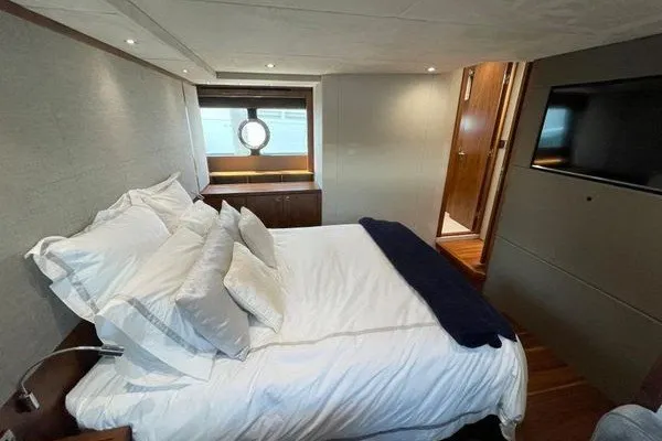 Slide: The Image of Luxurious bedroom interior of 2016 Sunseeker Predator 57 yacht with modern decor. - 54