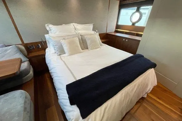 Slide: The Image of Luxurious bedroom interior of 2016 Sunseeker Predator 57 yacht with elegant bedding. - 53