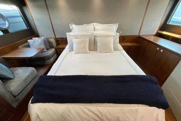 Slide: The Image of Luxurious bedroom interior of 2016 Sunseeker Predator 57 yacht with elegant bedding. - 50
