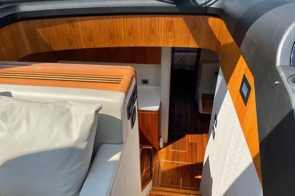 Slide: The Image of Interior view of 2016 Sunseeker Predator 57 yacht with wooden finishes and modern design. - 27