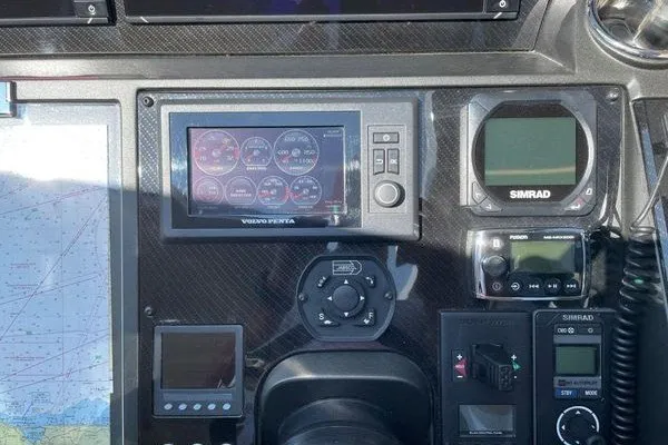 Slide: The Image of Control panel of a 2016 Sunseeker Predator 57 yacht with navigation instruments. - 24