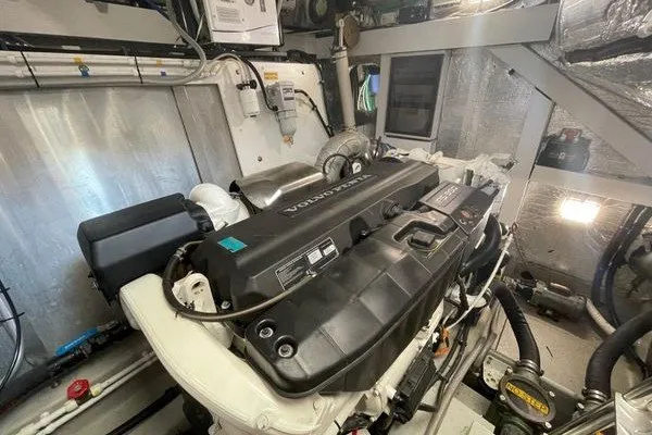 Slide: The Image of Engine room of 2016 Sunseeker Predator 57 yacht, featuring a Volvo Penta engine. - 61