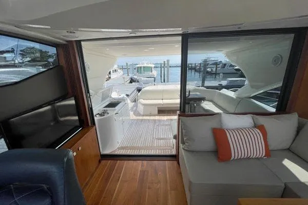 Slide: The Image of Interior view of 2016 Sunseeker Predator 57 yacht with open deck and seating area. - 18