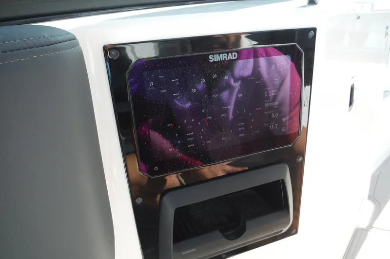 Slide: The Image of Simrad display on 2025 Chaparral 310 OSX boat dashboard. - 50