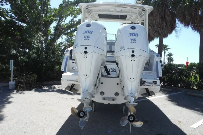 Slide: The Image of 2025 Chaparral 310 OSX boat with dual Yamaha 300 V6 outboard engines. - 26