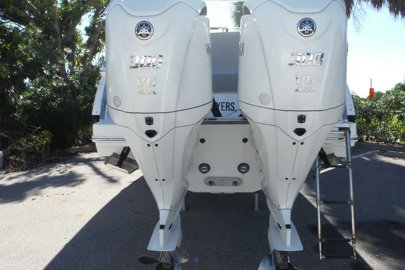 Slide: The Image of Twin Yamaha 300 V6 outboard engines on a 2025 Chaparral 310 OSX boat. - 63