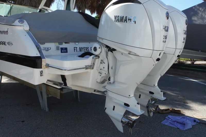 Slide: The Image of 2025 Chaparral 310 OSX boat with twin Yamaha outboard engines in Fort Myers. - 64