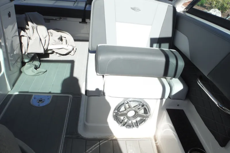 Slide: The Image of Interior of 2025 Chaparral 310 OSX boat with seating and speaker detail. - 51