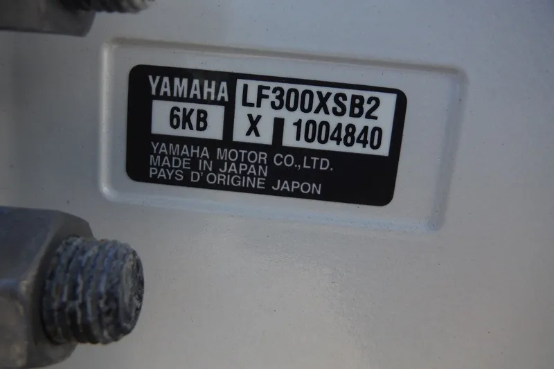 Slide: The Image of Yamaha motor label on 2025 Chaparral 310 OSX, made in Japan. - 65