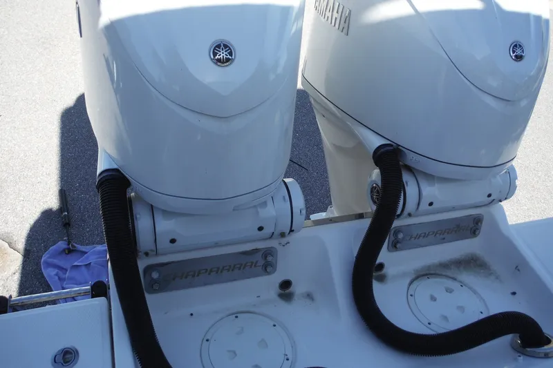 Slide: The Image of Twin Yamaha outboard engines on a 2025 Chaparral 310 OSX boat. - 61