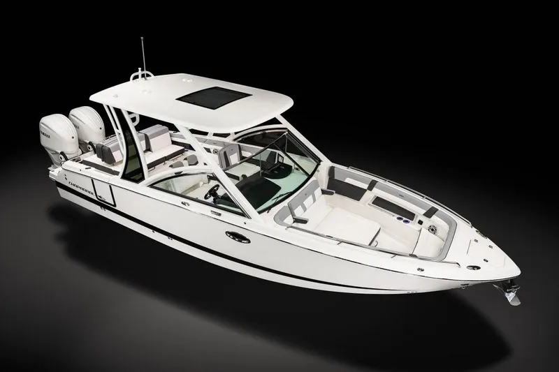 Slide: The Image of Manufacturer Provided Image: 2025 Chaparral 310 OSX boat with sleek design and dual engines. - 17