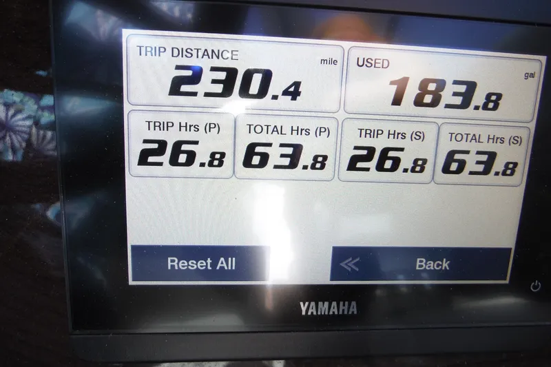 Slide: The Image of Display screen showing trip data: 230.4 miles, 183.8 gallons used, 2025 Chaparral 310 OSX. - 44