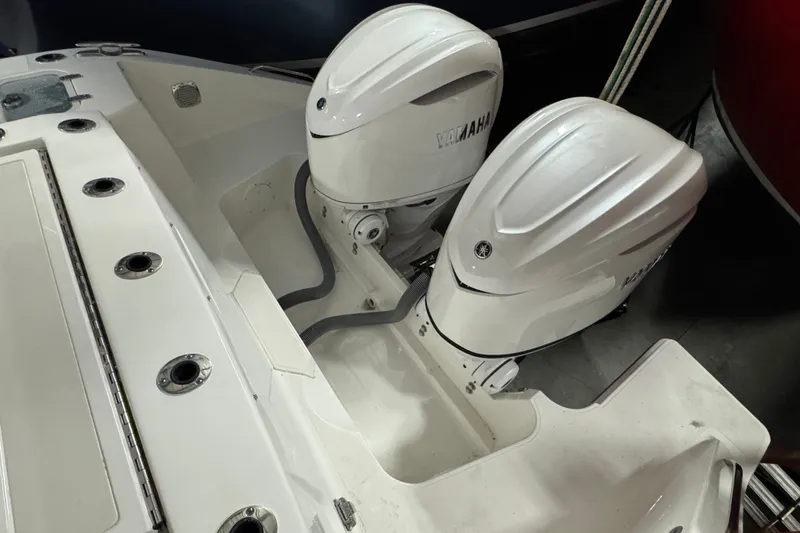 Slide: The Image of 2026 Pursuit DC 326 Dual Console with twin Yamaha outboard engines. - 6