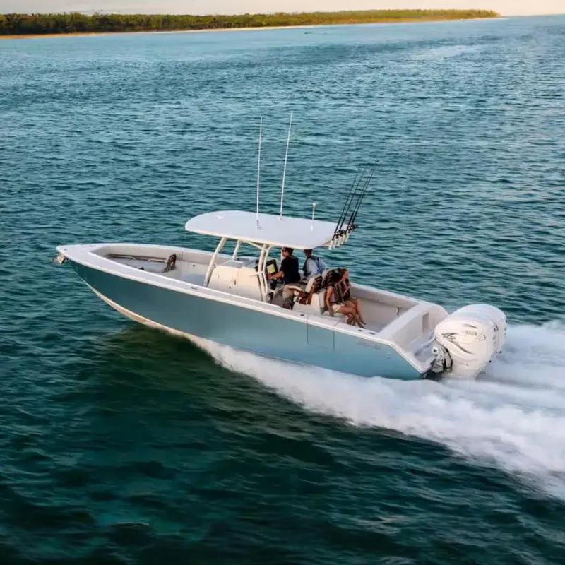 The Image of 2025 Jupiter 34 boat cruising on open water, featuring sleek design and powerful engines. - 2