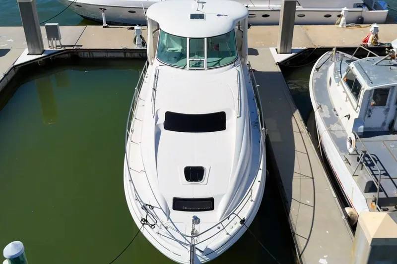 Slide: The Image of 2005 Sea Ray 390 Motor Yacht docked at marina, aerial view. - 1