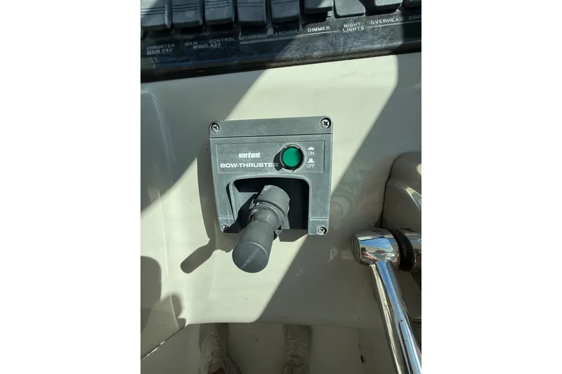 Slide: The Image of Bow thruster control panel on 2005 Sea Ray 390 Motor Yacht dashboard. - 14