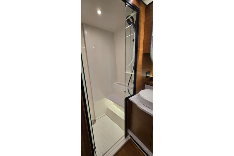 Slide: The Image of Luxurious bathroom interior of 2026 Tiara Yachts 56 LS, featuring modern shower design. - 62